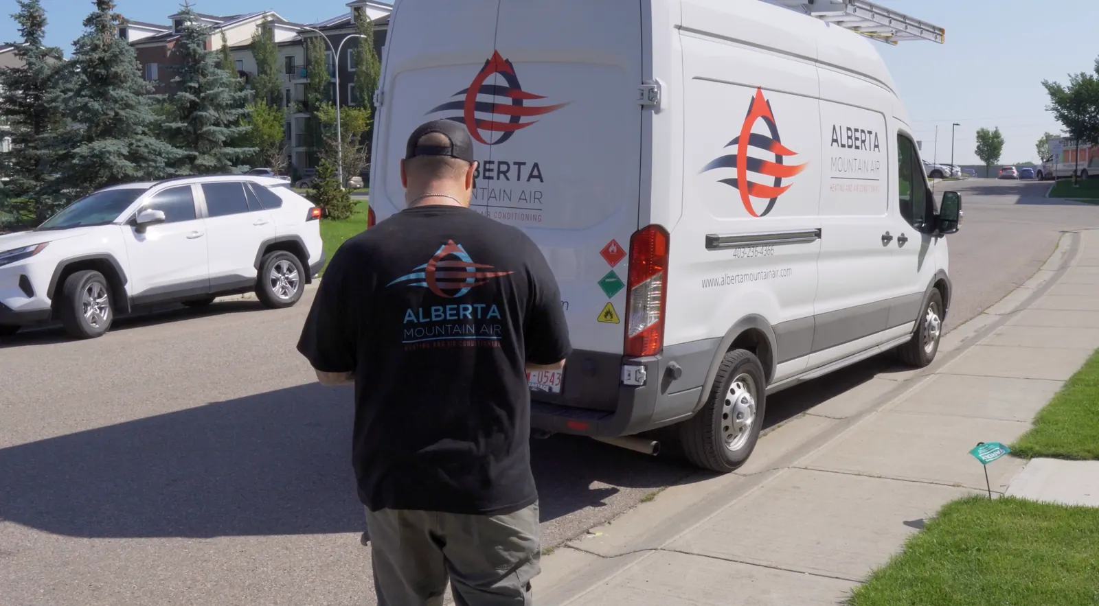 Alberta Mountain Air technician arriving to provide furnace and air conditioning service in Airdrie, Alberta