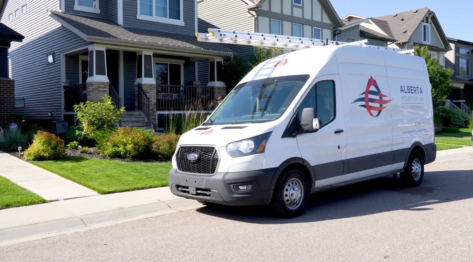 Alberta Mountain Air branded service van in Calgary