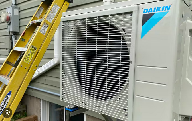 How can you prevent a heat pump from freezing in winter