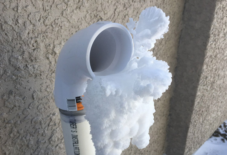 How to deal with ice in a furnace vent pipe